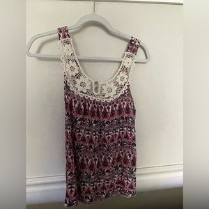 Style Rack tank top. Delicate lace top with buttons, colorful designed bottom.
